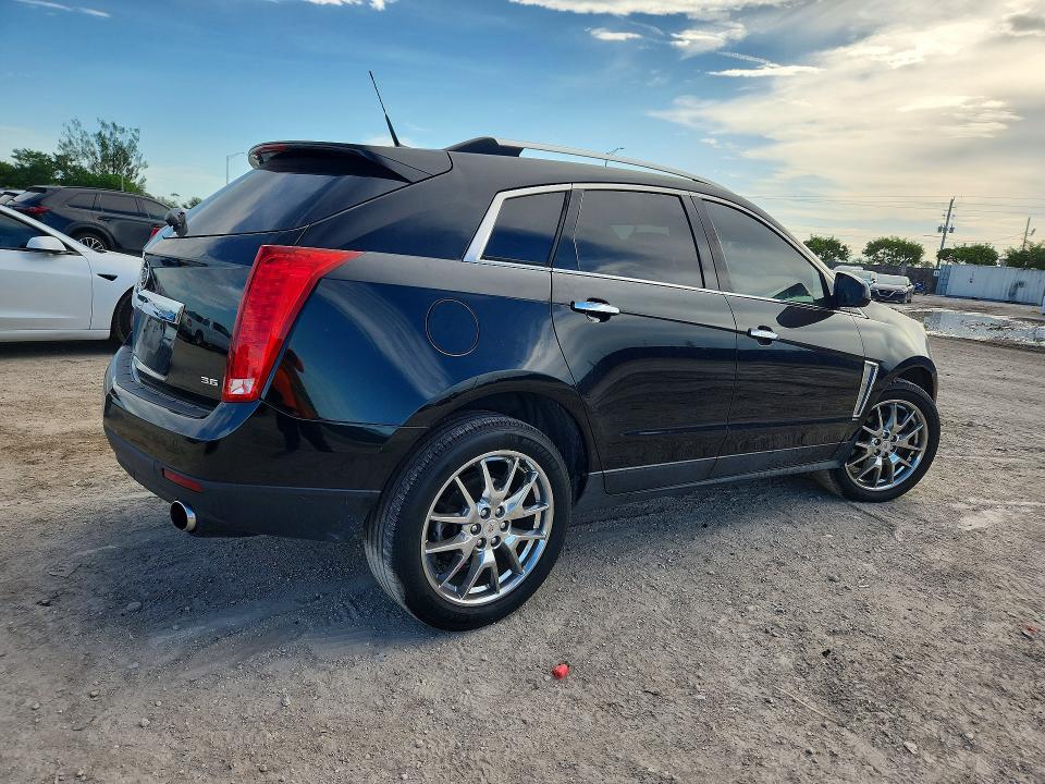 Photo 3 from auction – 2013 CADILLAC SRX with VIN 3GYFNDE37DS648062