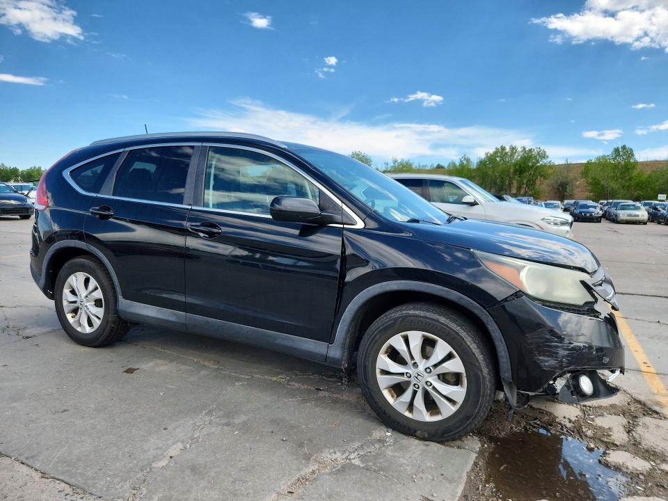 Photo 4 from auction – 2013 HONDA CR-V with VIN 2HKRM4H76DH672531