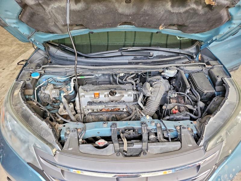 Photo 12 from auction – 2014 HONDA CR-V with VIN 2HKRM4H35EH673930