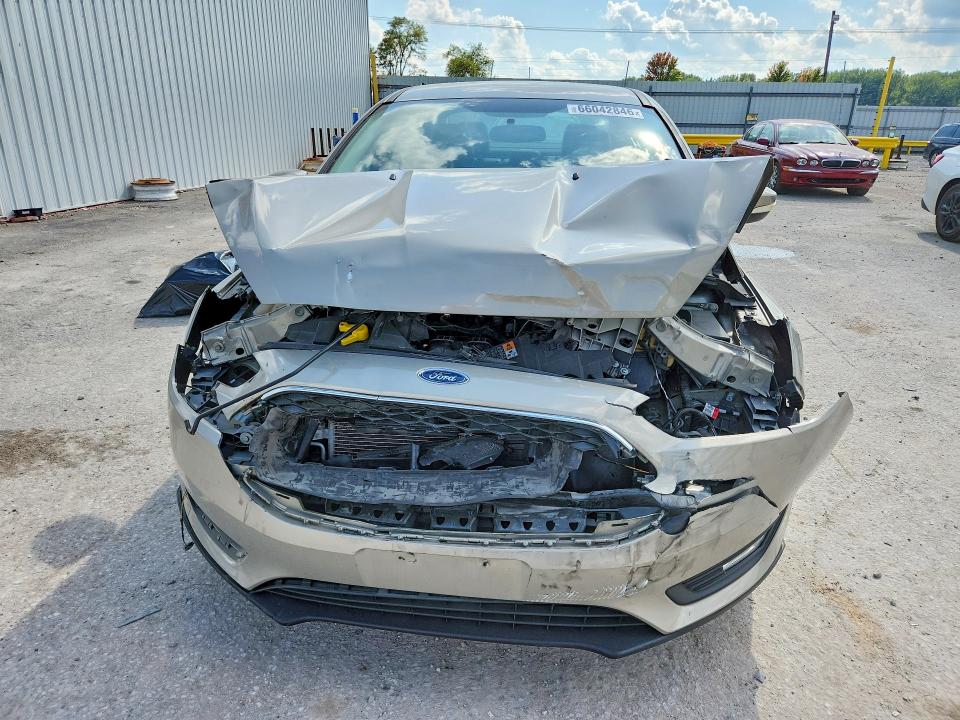 Photo 5 from auction – 2015 FORD FOCUS with VIN 1FADP3F2XFL255453