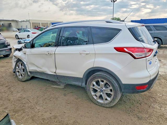 Photo 2 from auction – 2014 FORD ESCAPE with VIN 1FMCU0JX6EUC82556