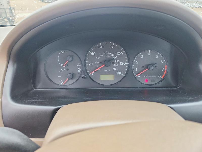 Photo 9 from auction – 1999 MAZDA PROTEGE with VIN JM1BJ2225X0117745