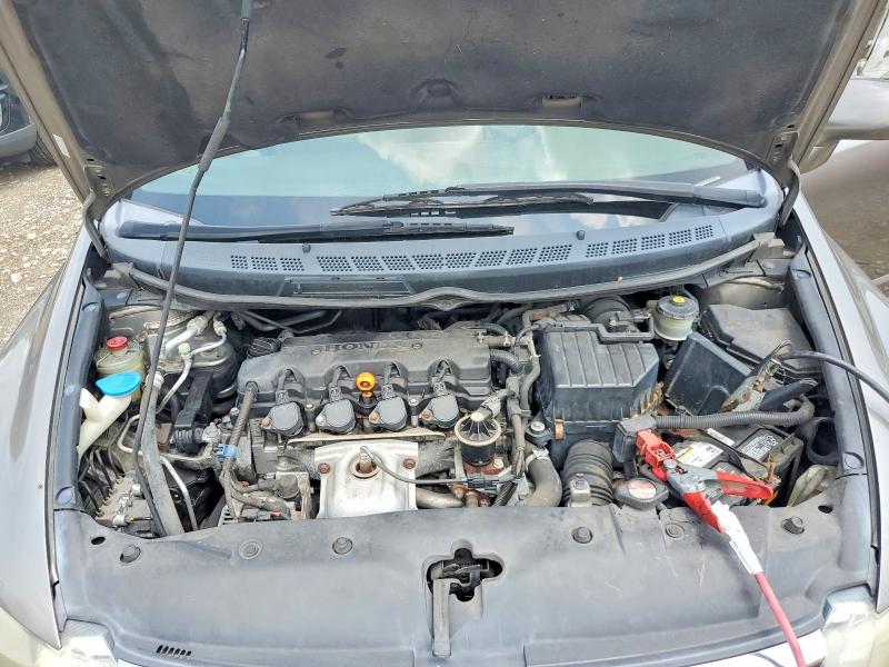 Photo 11 from auction – 2006 HONDA CIVIC with VIN JHMFA16826S003052