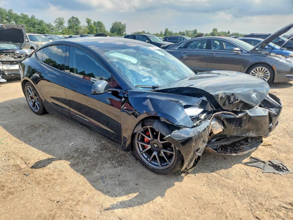 Photo 4 from auction – 2023 TESLA MODEL 3 with VIN 5YJ3E1EA1PF619711