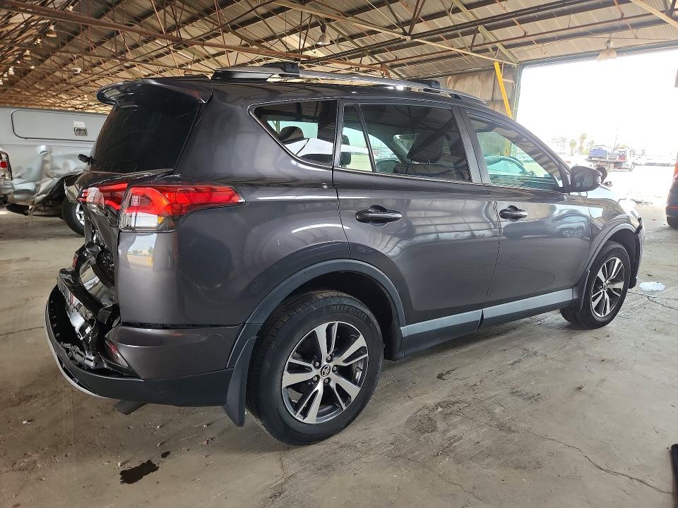 Photo 3 from auction – 2018 TOYOTA RAV4 with VIN 2T3RFREV3JW719979