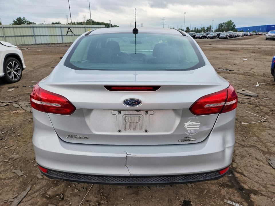 Photo 6 from auction – 2016 FORD FOCUS with VIN 1FADP3F24GL359292