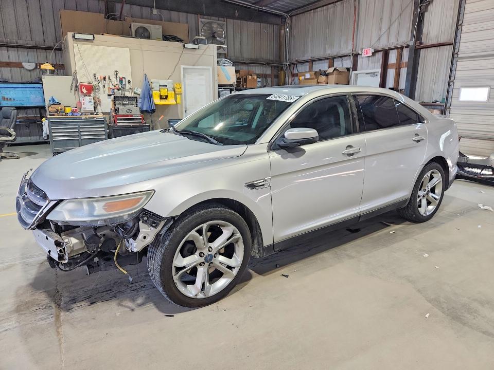 FORD TAURUS 2010 with VIN 1FAHP2KTXAG165473 - Photo from auction
