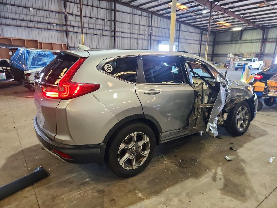Photo 3 from auction – 2018 HONDA CR-V with VIN 7FARW1H81JE015085