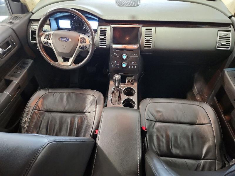 Photo 8 from auction – 2016 FORD FLEX with VIN 2FMHK6C83GBA11550