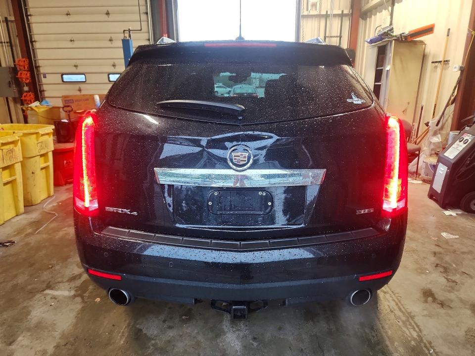 Photo 6 from auction – 2015 CADILLAC SRX with VIN 3GYFNGE34FS624354