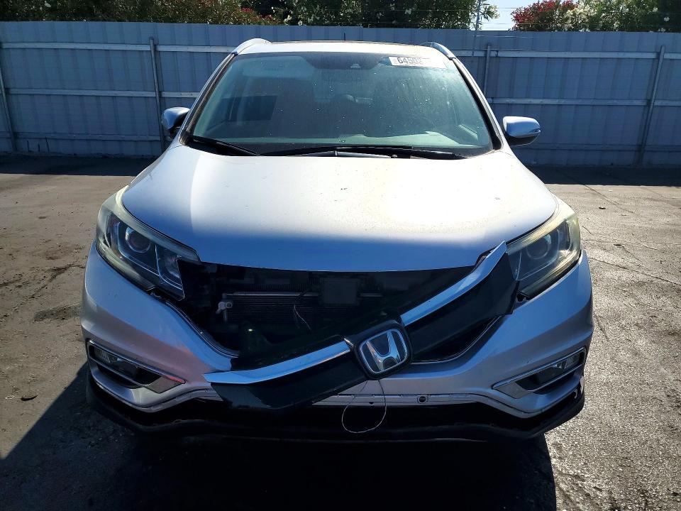 Photo 5 from auction – 2016 HONDA CR-V with VIN 5J6RM4H96GL042777
