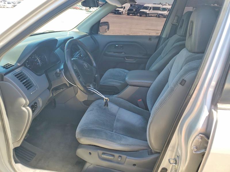 Photo 7 from auction – 2004 HONDA PILOT with VIN 2HKYF187X4H573358