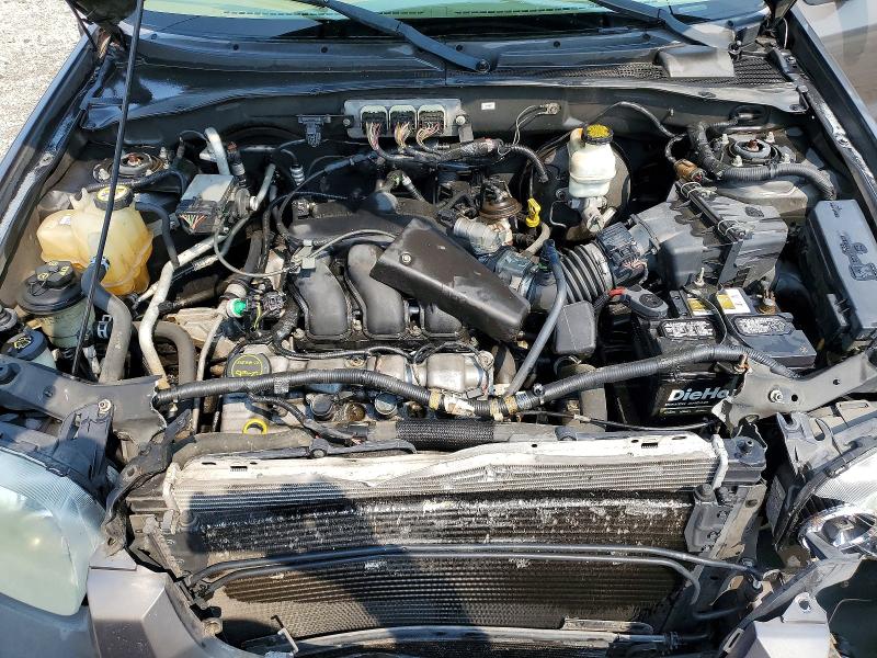 Photo 12 from auction – 2006 FORD ESCAPE with VIN 1FMCU041X6KD54671
