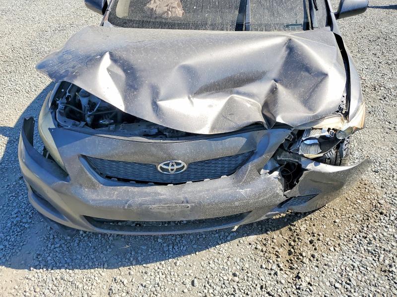 Photo 11 from auction – 2009 TOYOTA COROLLA with VIN JTDBL40E799030138