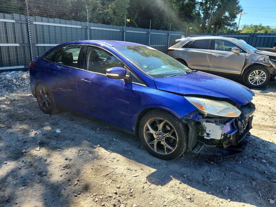 Photo 4 from auction – 2014 FORD FOCUS with VIN 1FADP3F26EL306977