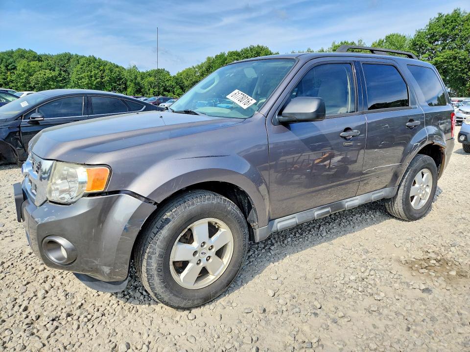 FORD ESCAPE 2011 with VIN 1FMCU0D72BKC31378 - Photo from auction