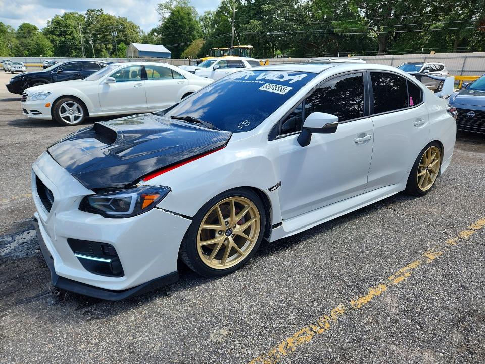 SUBARU WRX 2017 with VIN JF1VA1L62H9833563 - Photo from auction