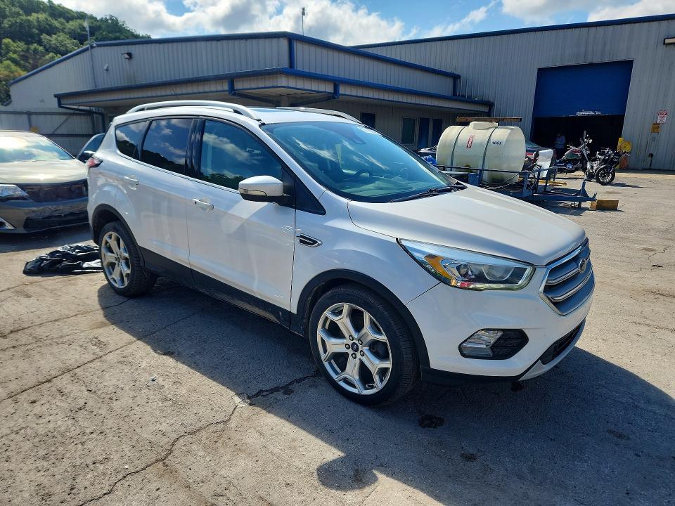 Photo 4 from auction – 2017 FORD ESCAPE with VIN 1FMCU9J98HUE21600