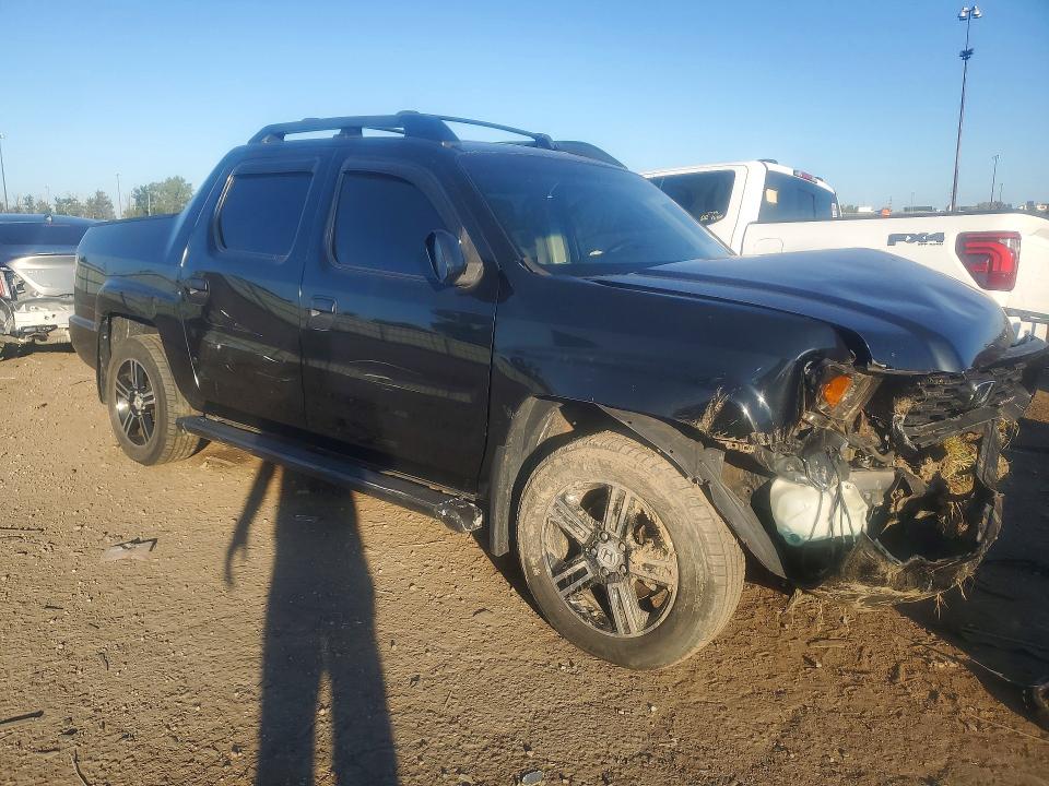 Photo 4 from auction – 2013 HONDA RIDGELINE with VIN 5FPYK1F79DB001573