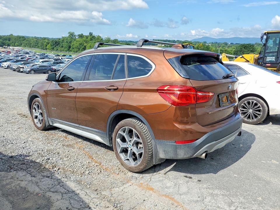 Foto 2 de la subasta – 2016 BMW X1 con VIN WBXHT3C37GP880247
