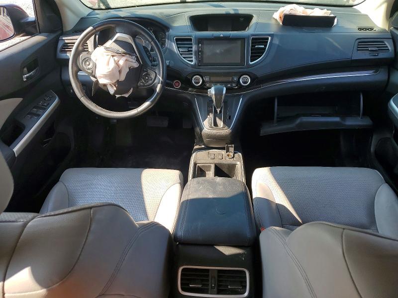 Photo 8 from auction – 2015 HONDA CR-V with VIN 2HKRM4H73FH640204