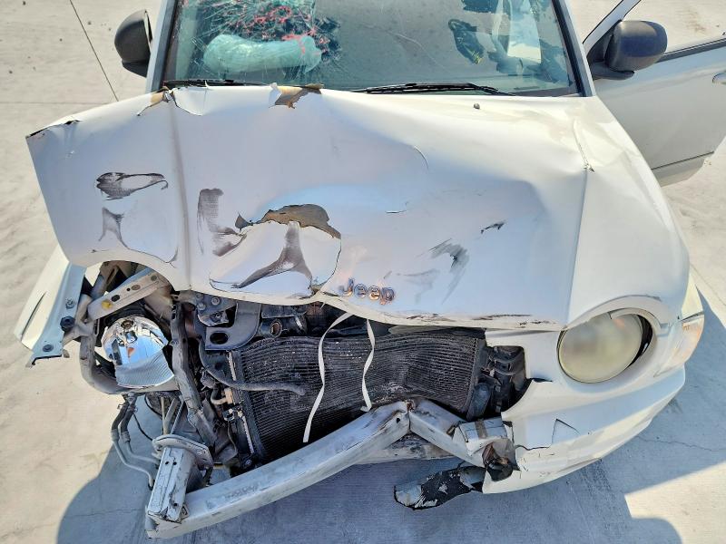 Foto 12 de la subasta – 2010 JEEP COMPASS con VIN 1J4NT4FB0AD593828