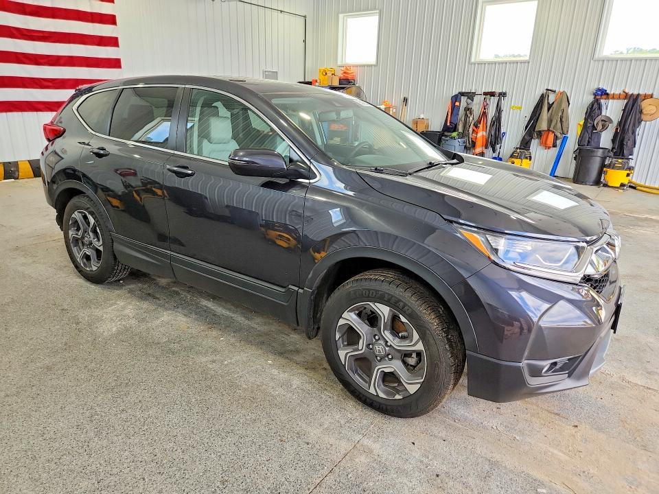 Photo 4 from auction – 2018 HONDA CR-V with VIN 2HKRW2H84JH615442