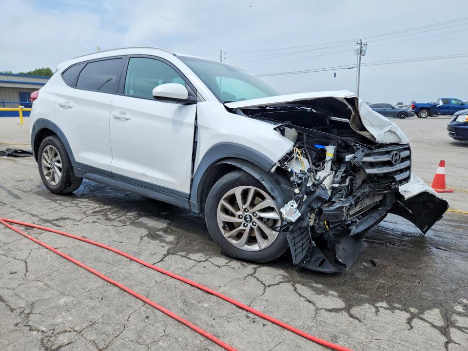 Photo 4 from auction – 2016 HYUNDAI TUCSON with VIN KM8J3CA40GU107112