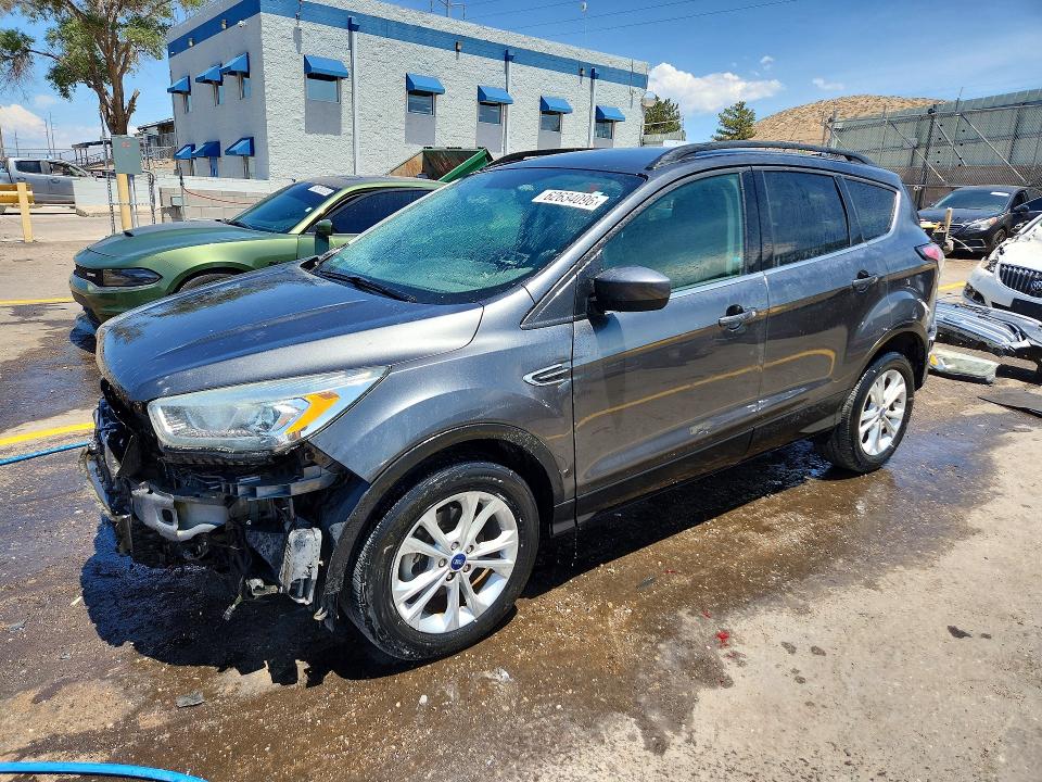 FORD ESCAPE 2017 with VIN 1FMCU0GD6HUC10922 - Photo from auction