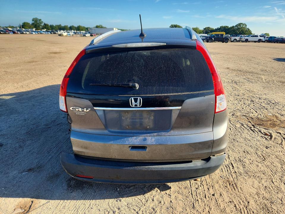Photo 6 from auction – 2014 HONDA CR-V with VIN 2HKRM3H77EH506899