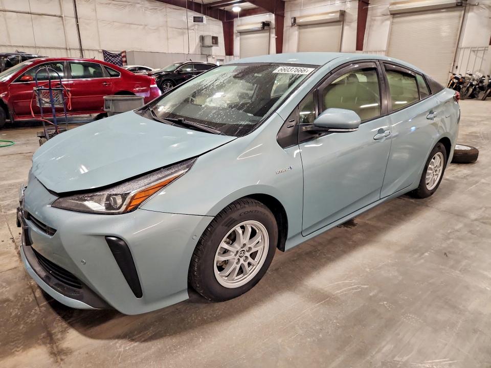 TOYOTA PRIUS 2021 with VIN JTDKAMFU5M3145238 - Photo from auction