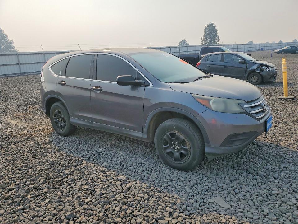 Photo 4 from auction – 2013 HONDA CR-V with VIN 2HKRM4H30DH676359