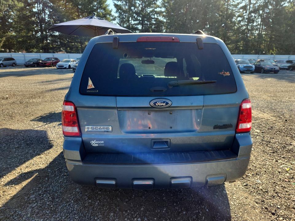 Photo 6 from auction – 2011 FORD ESCAPE with VIN 1FMCU0D78BKB71574