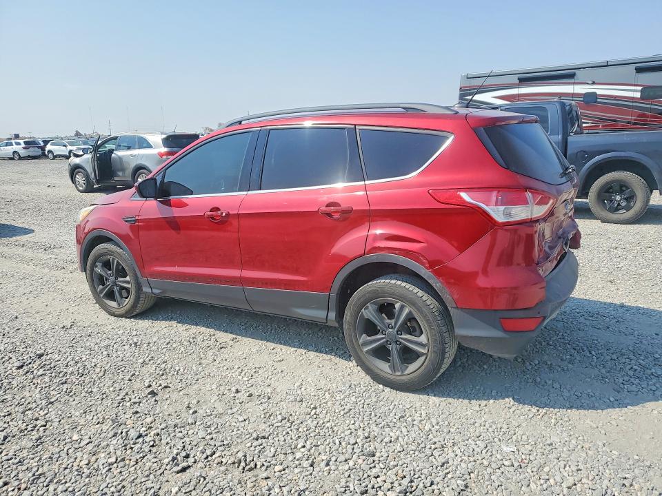 Photo 2 from auction – 2014 FORD ESCAPE with VIN 1FMCU9G98EUA93257
