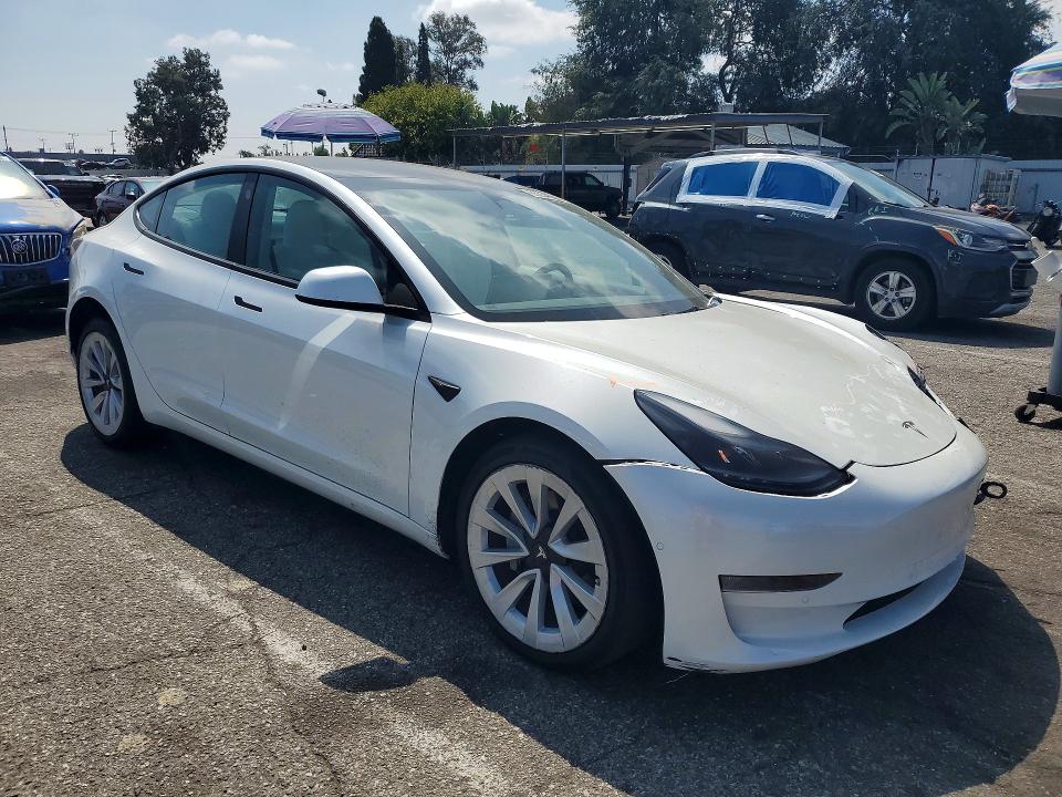 Photo 4 from auction – 2022 TESLA MODEL 3 with VIN 5YJ3E1EB7NF265344