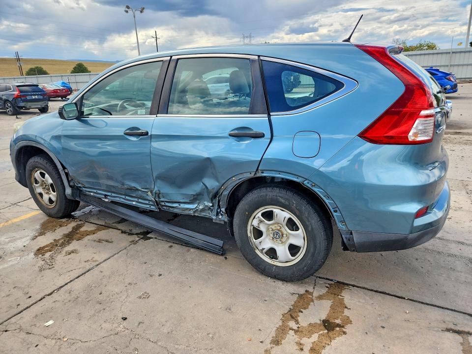 Photo 2 from auction – 2015 HONDA CR-V with VIN 5J6RM4H32FL083384
