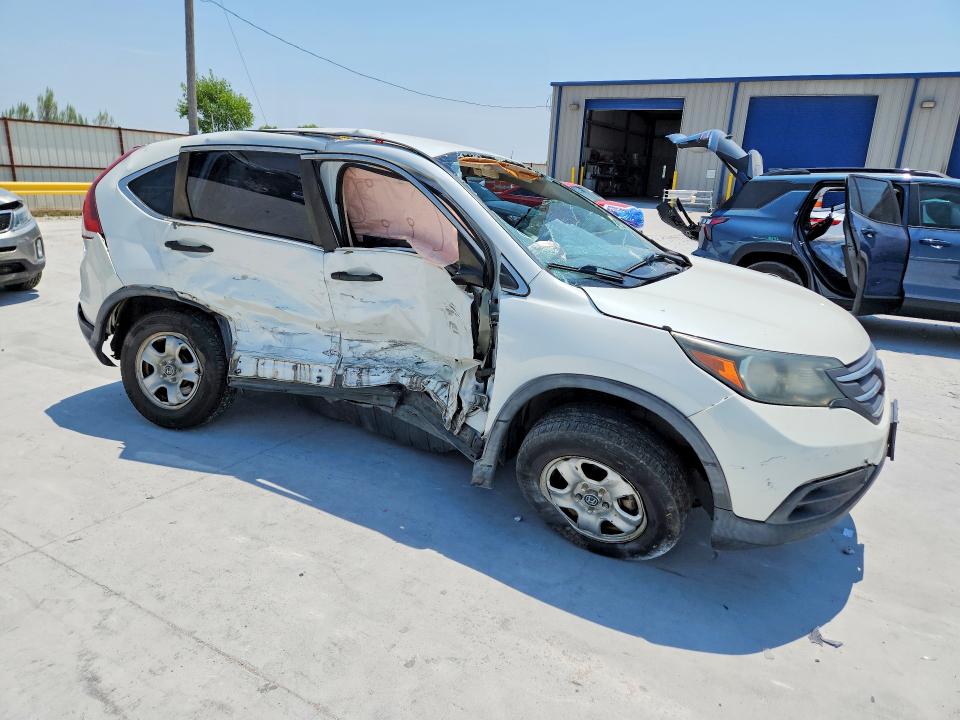 Photo 4 from auction – 2014 HONDA CR-V with VIN 5J6RM4H30EL006575