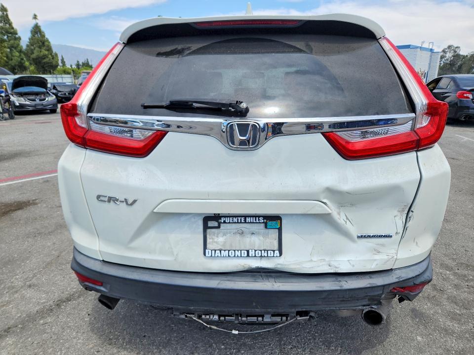 Photo 6 from auction – 2017 HONDA CR-V with VIN 2HKRW1H97HH506888