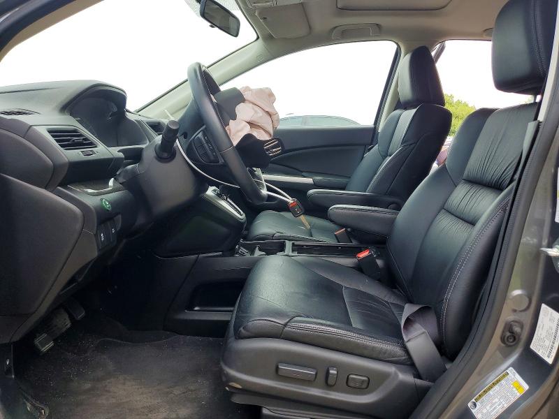 Photo 7 from auction – 2014 HONDA CR-V with VIN 2HKRM4H70EH124784