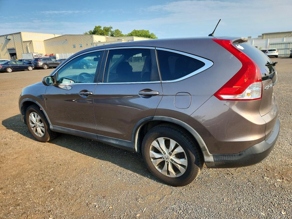 Photo 2 from auction – 2014 HONDA CR-V with VIN 5J6RM4H56EL000796
