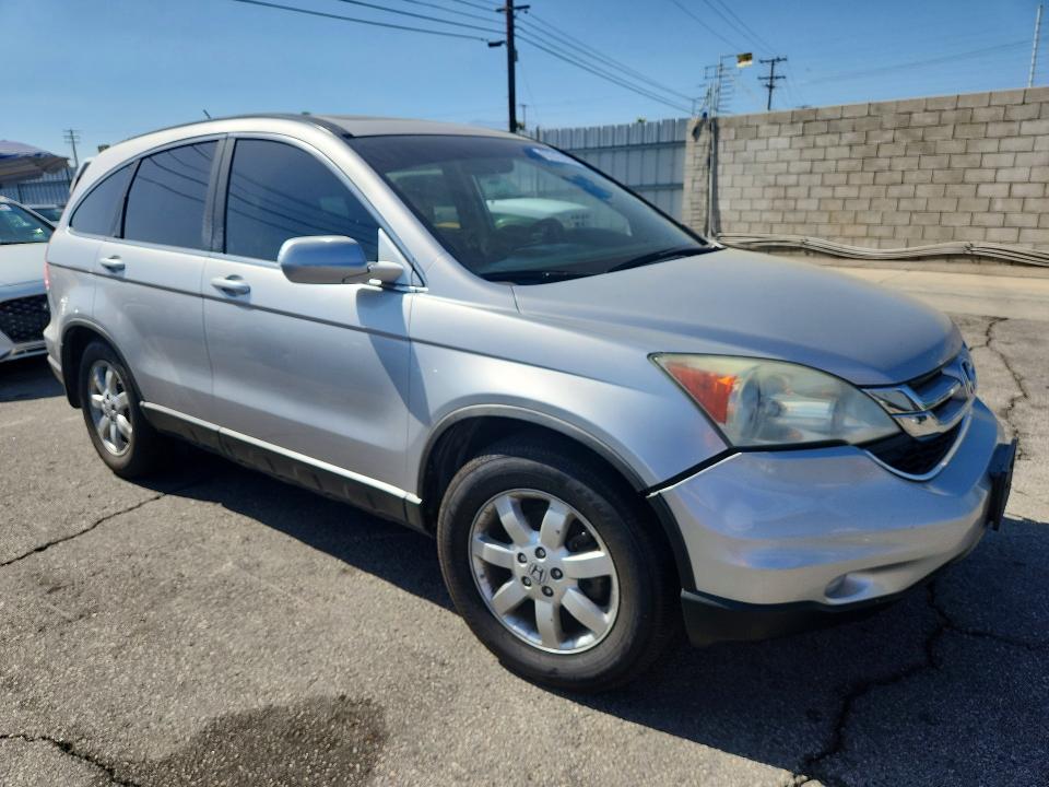Photo 4 from auction – 2011 HONDA CR-V with VIN 5J6RE3H7XBL024801
