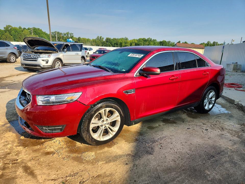 FORD TAURUS 2015 with VIN 1FAHP2E85FG208812 - Photo from auction