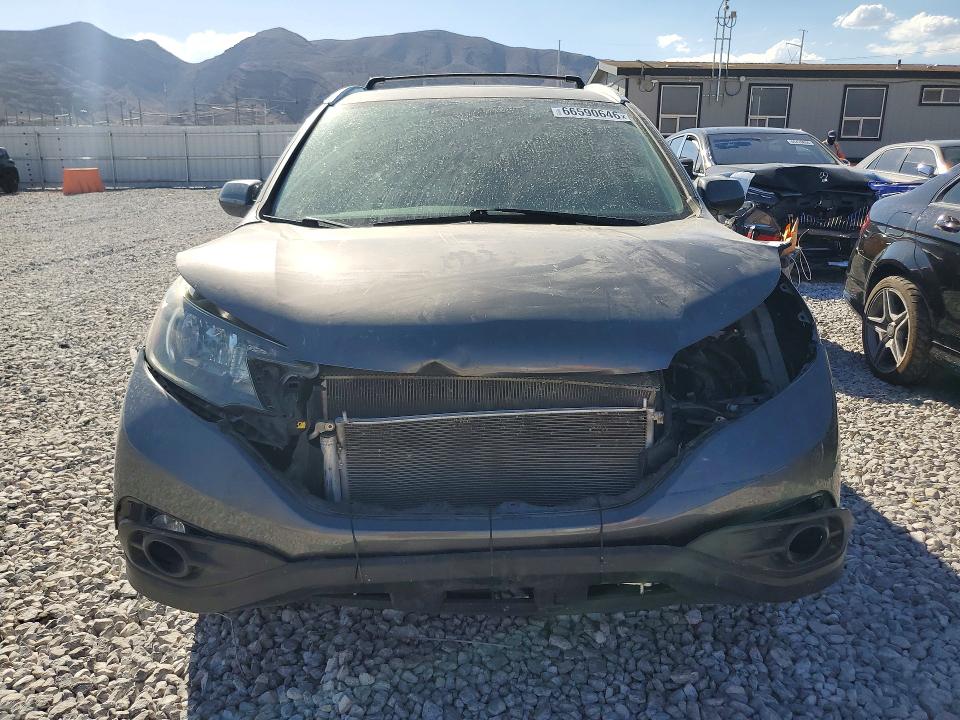 Photo 5 from auction – 2014 HONDA CR-V with VIN 2HKRM3H77EH505090