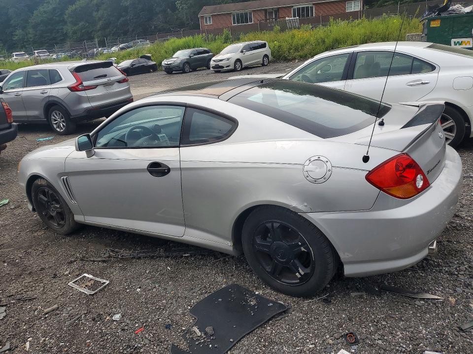 Photo 2 from auction – 2003 HYUNDAI TIBURON with VIN KMHHN65F33U013208