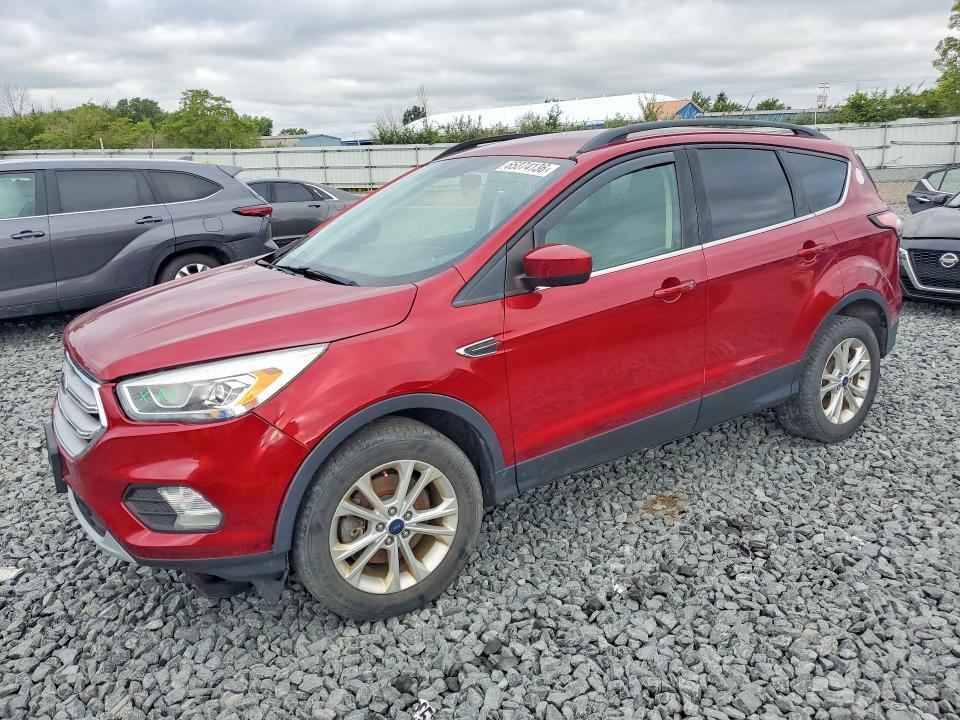 FORD ESCAPE 2018 with VIN 1FMCU9HD2JUB69567 - Photo from auction