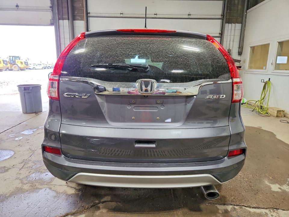 Photo 6 from auction – 2016 HONDA CR-V with VIN 5J6RM4H57GL078538