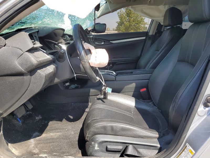 Photo 7 from auction – 2017 HONDA CIVIC with VIN 2HGFC1F9XHH102623