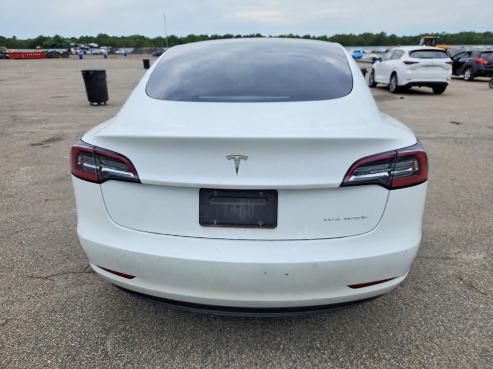 Снимка 6 от търг – 2022 TESLA MODEL 3 с VIN 5YJ3E1EB6NF115368
