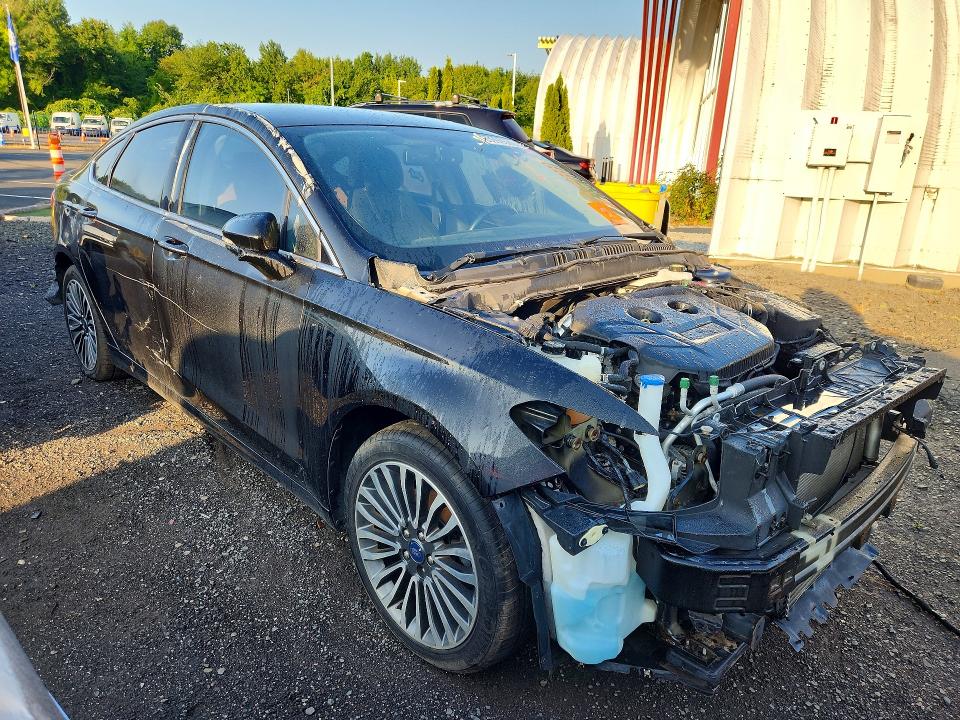 Photo 4 from auction – 2017 FORD FUSION with VIN 3FA6P0T91HR185340