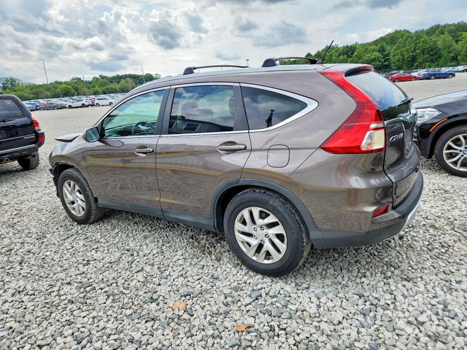 Photo 2 from auction – 2015 HONDA CR-V with VIN 2HKRM4H54FH607792